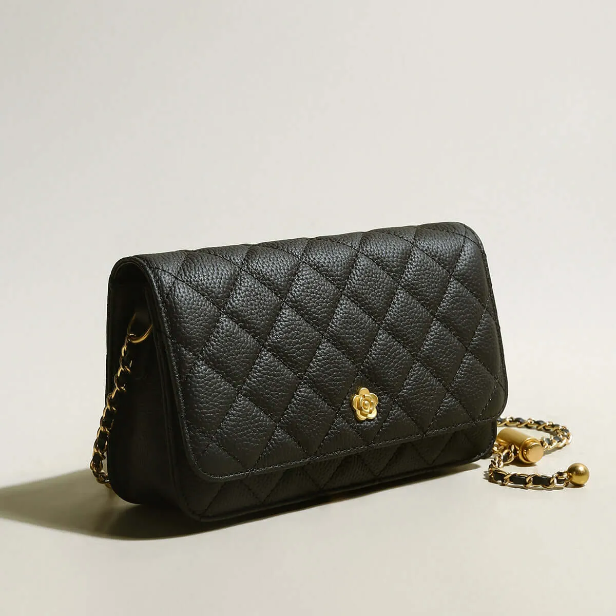 Black Quilted Bag with Golden Cylinder Chain Straps